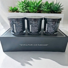 Premium Prayer Warrior Candle Set with three hand-poured coconut wax candles in sleek black glass jars. Fragrances include Esther’s bold licorice and strawberry, Hannah’s soft cashmere musk and rose, and Deborah’s warm amber and sandalwood. Ideal for spiritual home decor and long-lasting aroma.