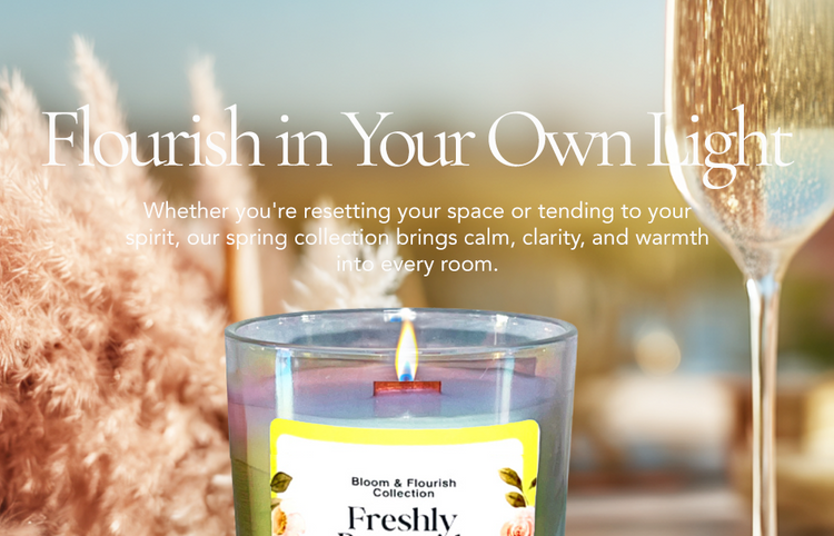 Intuition Flames spring collection display with 10 oz clean-burning candles in iridescent vessels, designed to refresh your space and soul.

